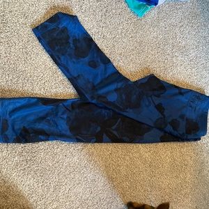Navy with black floral pattern, low rise capri leggings. Lululemon size 8.